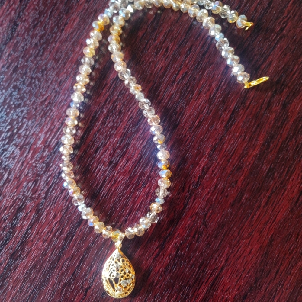I think of elegance and class when I designed this Swarovsky bead teardrop cz